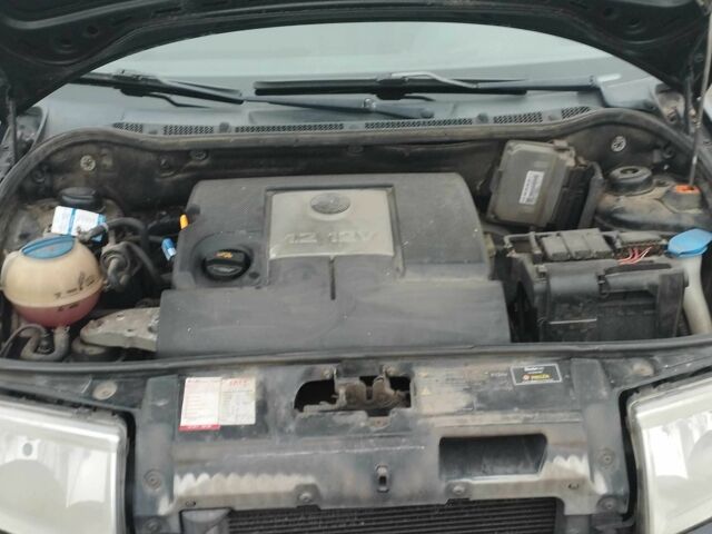 Черный Шкода Фабия, объемом двигателя 1.2 л и пробегом 272 тыс. км за 3500 $, фото 3 на Automoto.ua