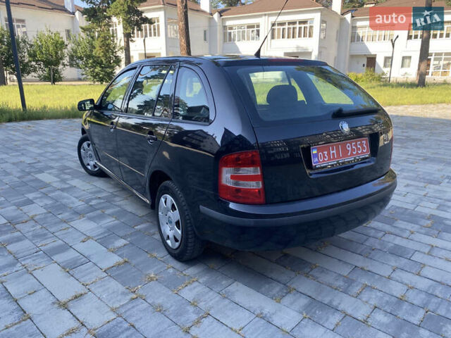 Черный Шкода Фабия, объемом двигателя 1.4 л и пробегом 201 тыс. км за 4750 $, фото 18 на Automoto.ua