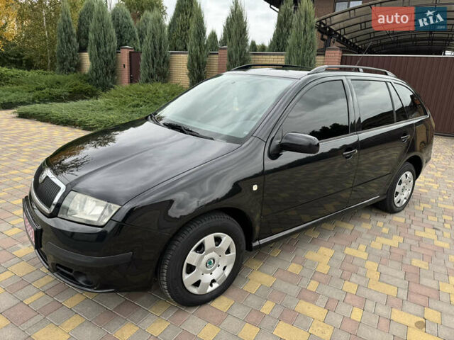 Чорний Шкода Фабія, об'ємом двигуна 1.4 л та пробігом 160 тис. км за 5777 $, фото 1 на Automoto.ua