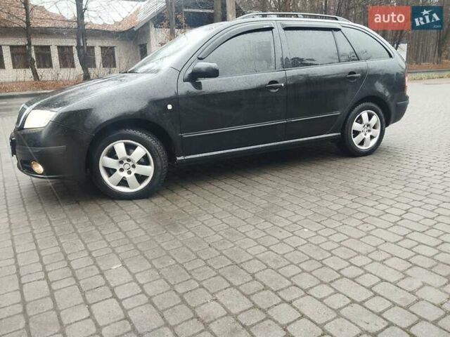 Черный Шкода Фабия, объемом двигателя 1.9 л и пробегом 315 тыс. км за 4890 $, фото 11 на Automoto.ua