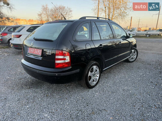 Черный Шкода Фабия, объемом двигателя 1.4 л и пробегом 200 тыс. км за 4999 $, фото 8 на Automoto.ua