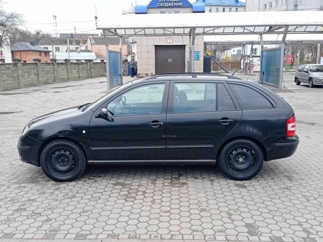Чорний Шкода Фабія, об'ємом двигуна 2 л та пробігом 386 тис. км за 4994 $, фото 3 на Automoto.ua