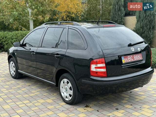 Чорний Шкода Фабія, об'ємом двигуна 1.4 л та пробігом 160 тис. км за 5777 $, фото 57 на Automoto.ua