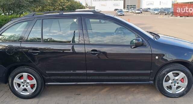 Черный Шкода Фабия, объемом двигателя 1.4 л и пробегом 177 тыс. км за 4700 $, фото 4 на Automoto.ua