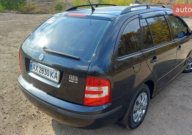 Черный Шкода Фабия, объемом двигателя 1.39 л и пробегом 252 тыс. км за 5000 $, фото 5 на Automoto.ua