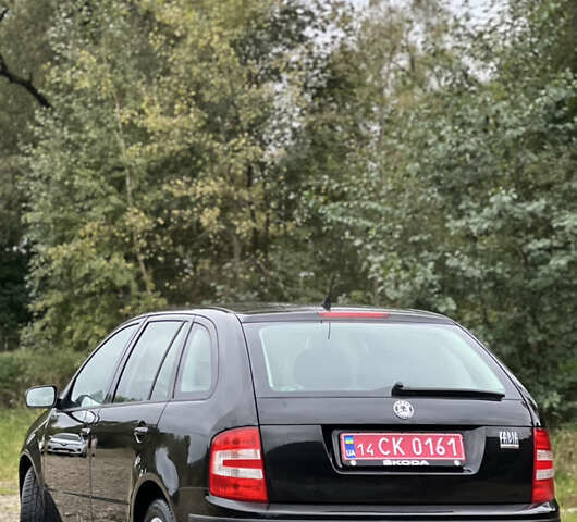 Черный Шкода Фабия, объемом двигателя 1.4 л и пробегом 220 тыс. км за 4450 $, фото 6 на Automoto.ua