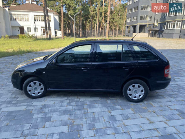 Черный Шкода Фабия, объемом двигателя 1.4 л и пробегом 201 тыс. км за 4750 $, фото 22 на Automoto.ua