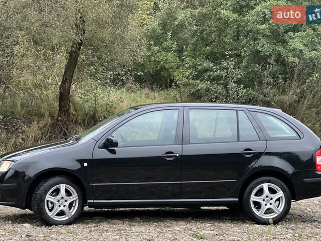 Черный Шкода Фабия, объемом двигателя 1.4 л и пробегом 220 тыс. км за 4450 $, фото 8 на Automoto.ua