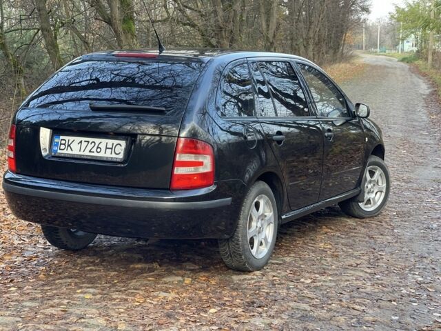Черный Шкода Фабия, объемом двигателя 1.2 л и пробегом 380 тыс. км за 3100 $, фото 4 на Automoto.ua