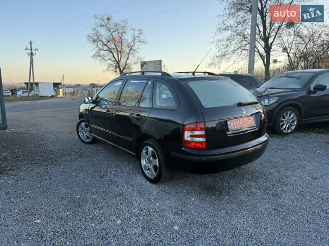 Черный Шкода Фабия, объемом двигателя 1.4 л и пробегом 200 тыс. км за 4999 $, фото 3 на Automoto.ua