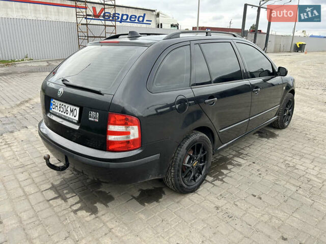 Черный Шкода Фабия, объемом двигателя 1.39 л и пробегом 226 тыс. км за 3900 $, фото 5 на Automoto.ua