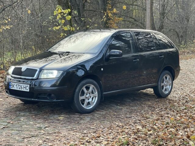 Черный Шкода Фабия, объемом двигателя 1.2 л и пробегом 380 тыс. км за 3100 $, фото 3 на Automoto.ua