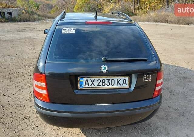 Черный Шкода Фабия, объемом двигателя 1.39 л и пробегом 252 тыс. км за 5000 $, фото 6 на Automoto.ua