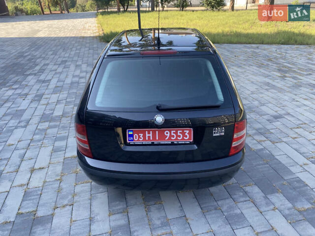 Черный Шкода Фабия, объемом двигателя 1.4 л и пробегом 201 тыс. км за 4750 $, фото 17 на Automoto.ua