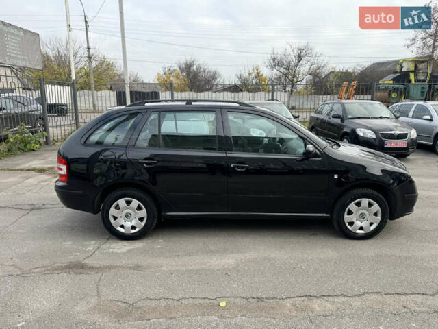 Черный Шкода Фабия, объемом двигателя 1.4 л и пробегом 173 тыс. км за 4900 $, фото 8 на Automoto.ua