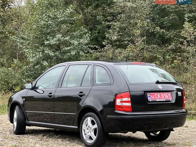 Черный Шкода Фабия, объемом двигателя 1.4 л и пробегом 220 тыс. км за 4450 $, фото 7 на Automoto.ua