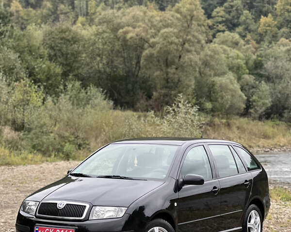 Черный Шкода Фабия, объемом двигателя 1.4 л и пробегом 220 тыс. км за 4450 $, фото 10 на Automoto.ua