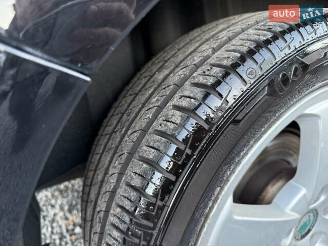 Черный Шкода Фабия, объемом двигателя 1.4 л и пробегом 200 тыс. км за 4999 $, фото 19 на Automoto.ua