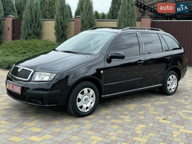 Чорний Шкода Фабія, об'ємом двигуна 1.4 л та пробігом 160 тис. км за 5777 $, фото 5 на Automoto.ua