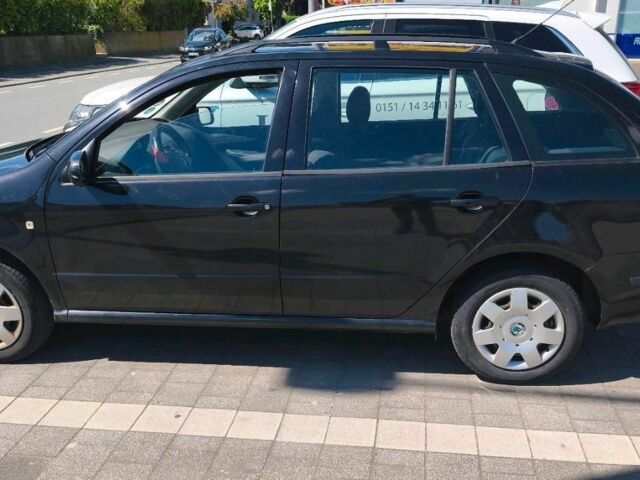 Черный Шкода Фабия, объемом двигателя 1.4 л и пробегом 230 тыс. км за 4150 $, фото 2 на Automoto.ua