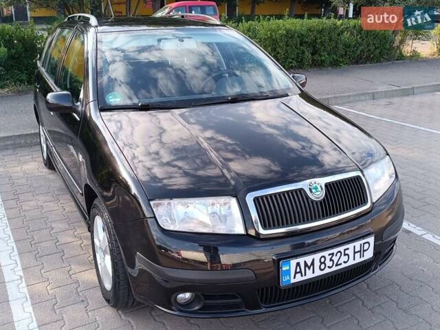 Черный Шкода Фабия, объемом двигателя 1.4 л и пробегом 177 тыс. км за 4700 $, фото 2 на Automoto.ua
