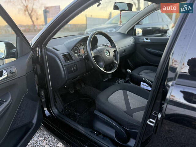 Черный Шкода Фабия, объемом двигателя 1.4 л и пробегом 200 тыс. км за 4999 $, фото 12 на Automoto.ua