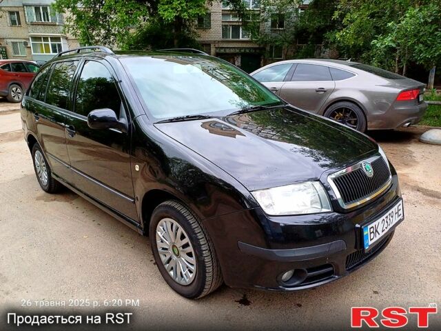 Черный Шкода Фабия, объемом двигателя 1.4 л и пробегом 260 тыс. км за 4499 $, фото 6 на Automoto.ua