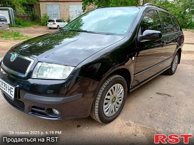 Черный Шкода Фабия, объемом двигателя 1.4 л и пробегом 260 тыс. км за 4499 $, фото 7 на Automoto.ua