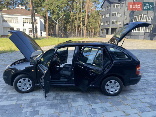 Черный Шкода Фабия, объемом двигателя 1.4 л и пробегом 201 тыс. км за 4750 $, фото 43 на Automoto.ua