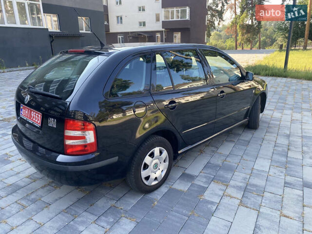 Черный Шкода Фабия, объемом двигателя 1.4 л и пробегом 201 тыс. км за 4750 $, фото 11 на Automoto.ua
