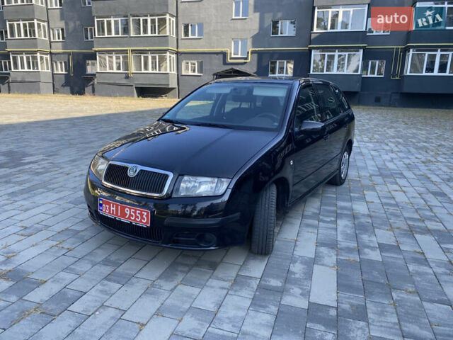 Черный Шкода Фабия, объемом двигателя 1.4 л и пробегом 201 тыс. км за 4750 $, фото 6 на Automoto.ua
