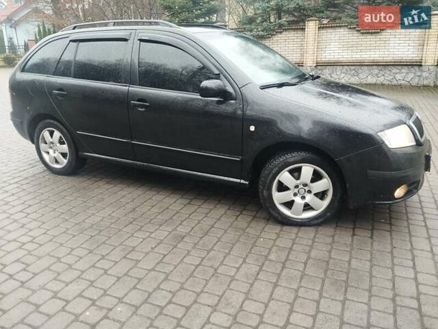 Черный Шкода Фабия, объемом двигателя 1.9 л и пробегом 315 тыс. км за 4890 $, фото 4 на Automoto.ua