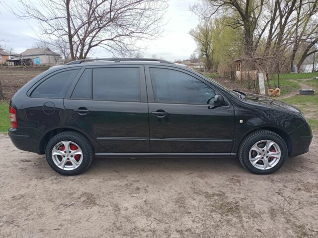 Черный Шкода Фабия, объемом двигателя 1.4 л и пробегом 232 тыс. км за 4999 $, фото 6 на Automoto.ua