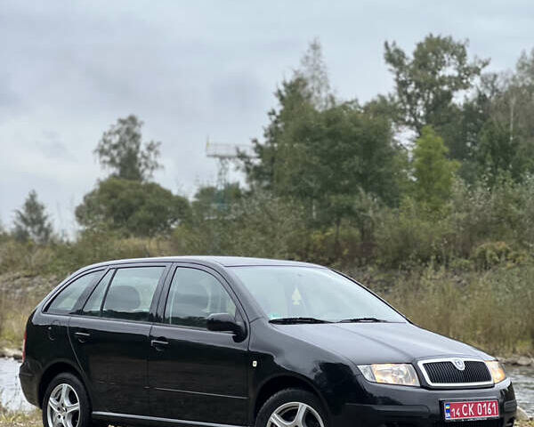 Черный Шкода Фабия, объемом двигателя 1.4 л и пробегом 220 тыс. км за 4450 $, фото 3 на Automoto.ua