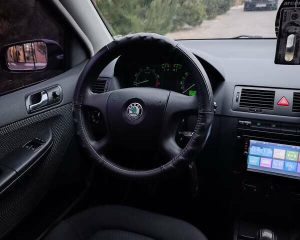 Черный Шкода Фабия, объемом двигателя 1.39 л и пробегом 193 тыс. км за 5500 $, фото 33 на Automoto.ua