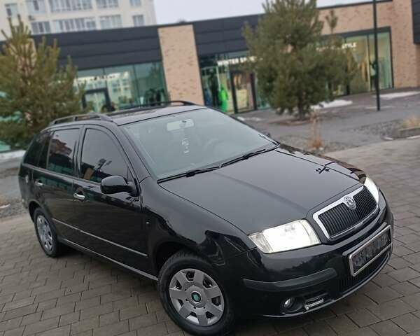 Черный Шкода Фабия, объемом двигателя 1.39 л и пробегом 193 тыс. км за 5500 $, фото 4 на Automoto.ua