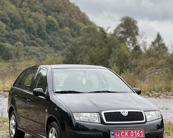 Черный Шкода Фабия, объемом двигателя 1.4 л и пробегом 220 тыс. км за 4450 $, фото 1 на Automoto.ua