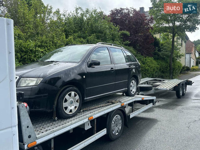 Черный Шкода Фабия, объемом двигателя 1.4 л и пробегом 230 тыс. км за 3850 $, фото 1 на Automoto.ua