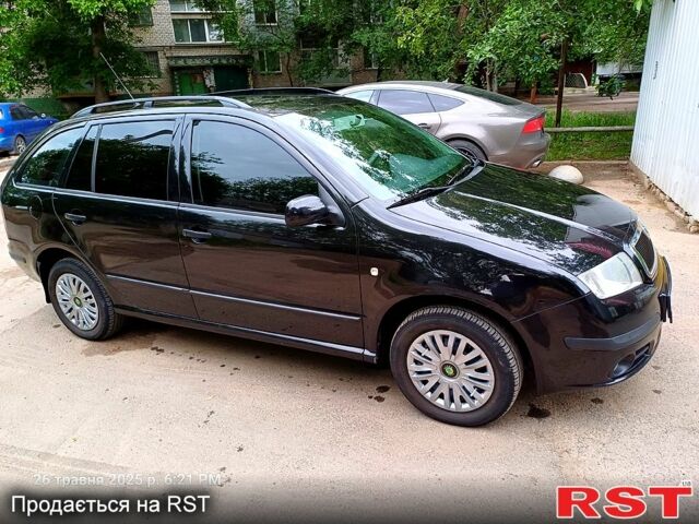 Черный Шкода Фабия, объемом двигателя 1.4 л и пробегом 260 тыс. км за 4499 $, фото 2 на Automoto.ua