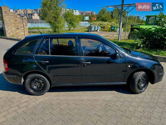 Черный Шкода Фабия, объемом двигателя 1.2 л и пробегом 262 тыс. км за 3800 $, фото 8 на Automoto.ua