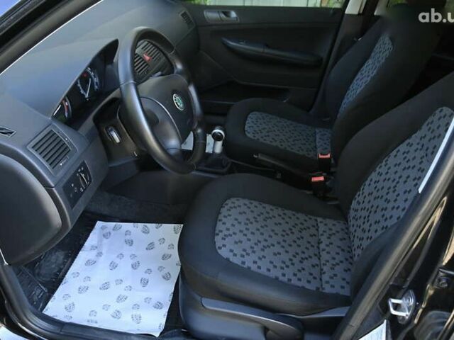 Шкода Фабия 2007 в Бердичеве на Automoto.ua Черный Шкода Фабия, объемом двигателя 1.4 л и пробегом 212 тыс. км за 4999 $, фото 19 на Automoto.ua