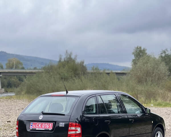 Черный Шкода Фабия, объемом двигателя 1.4 л и пробегом 220 тыс. км за 4450 $, фото 5 на Automoto.ua