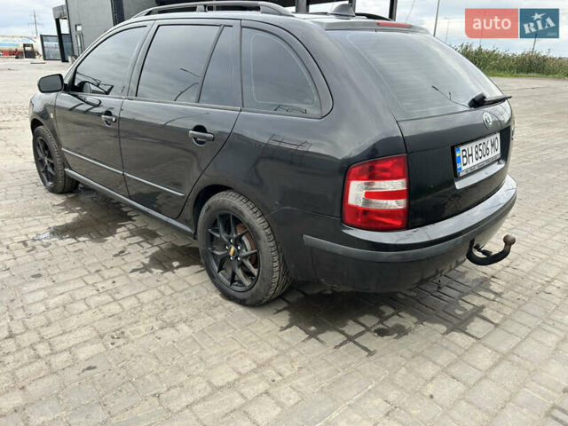 Черный Шкода Фабия, объемом двигателя 1.39 л и пробегом 226 тыс. км за 3900 $, фото 4 на Automoto.ua