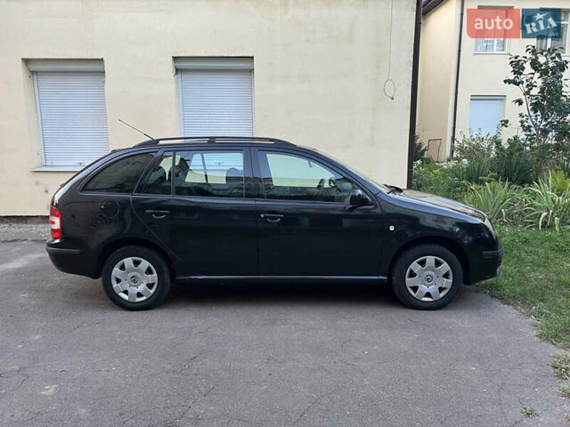 Черный Шкода Фабия, объемом двигателя 1.4 л и пробегом 270 тыс. км за 3950 $, фото 9 на Automoto.ua