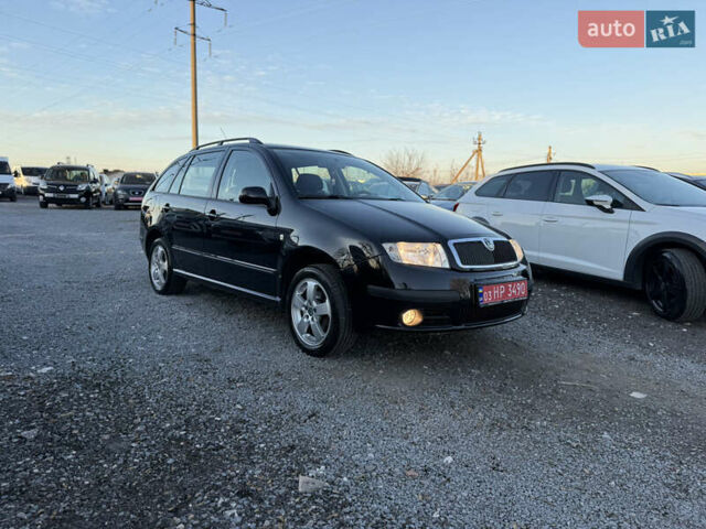 Черный Шкода Фабия, объемом двигателя 1.4 л и пробегом 200 тыс. км за 4999 $, фото 36 на Automoto.ua