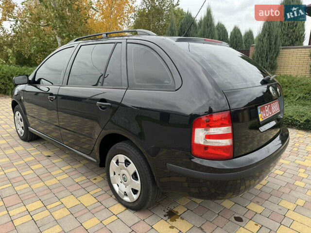 Чорний Шкода Фабія, об'ємом двигуна 1.4 л та пробігом 160 тис. км за 5777 $, фото 6 на Automoto.ua