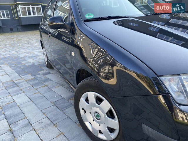 Черный Шкода Фабия, объемом двигателя 1.4 л и пробегом 201 тыс. км за 4750 $, фото 5 на Automoto.ua