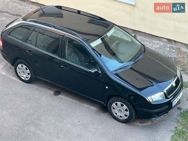 Черный Шкода Фабия, объемом двигателя 1.4 л и пробегом 270 тыс. км за 3950 $, фото 17 на Automoto.ua