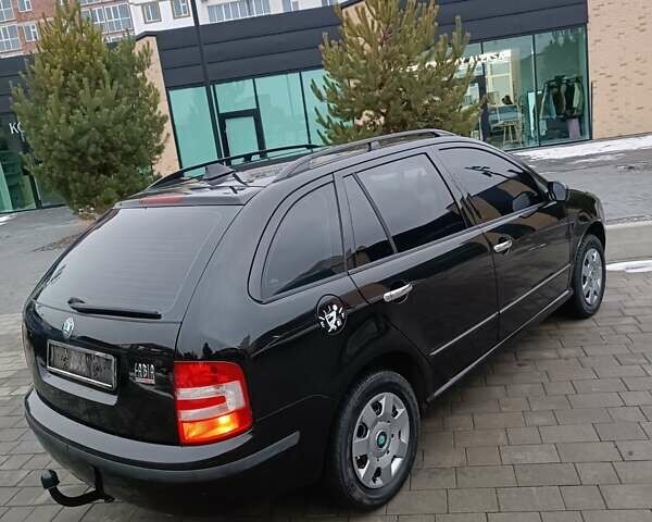 Черный Шкода Фабия, объемом двигателя 1.39 л и пробегом 193 тыс. км за 5500 $, фото 9 на Automoto.ua