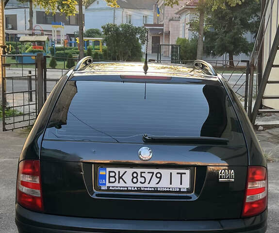 Черный Шкода Фабия, объемом двигателя 1.4 л и пробегом 270 тыс. км за 4400 $, фото 2 на Automoto.ua